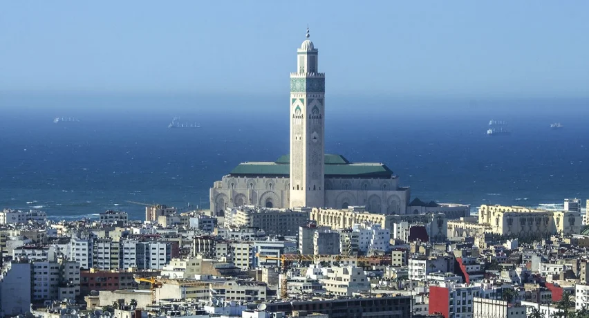 Panoramic view of the Hassan II Mosque on the Atlantic coast of Casablanca, featured in our modern city guides and Morocco travel advisory.